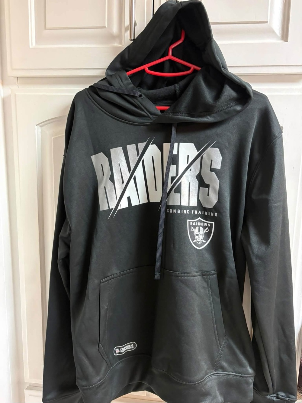 New Era Black Raiders Pullover Hoodie with Silver Logo